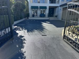 after repainting stenciled concrete driveway willoughby